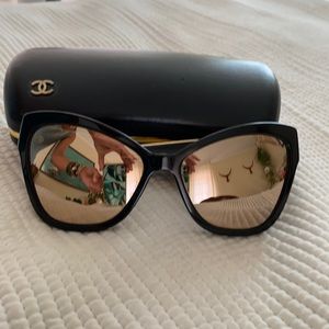 CHANEL gold and black cat eye sunglasses